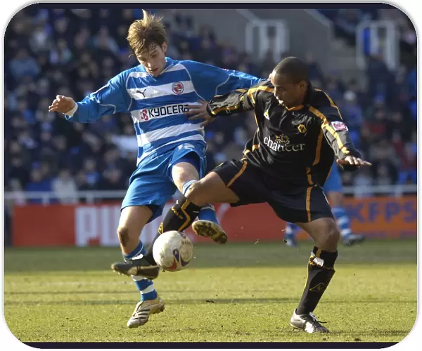 Bobby Convey challenges Paul Ince for the ball