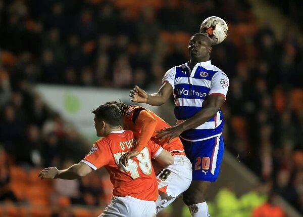 Aiyegbeni Yakubu Heads the Ball for Reading in Sky Bet Championship Match