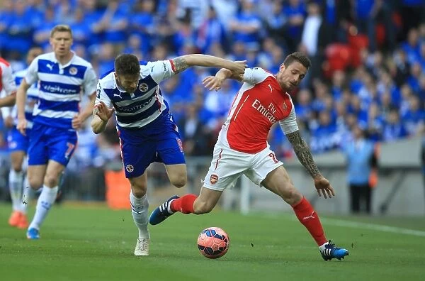 Battle at Wembley: Mackie vs Debuchy - A Clash of Determination in the FA Cup Semi-Final