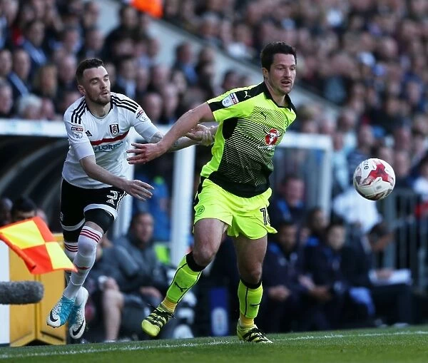 Fulham vs. Reading: Intense Moment between Kermorgant and Malone in Sky Bet Championship Play-off First Leg at Craven Cottage