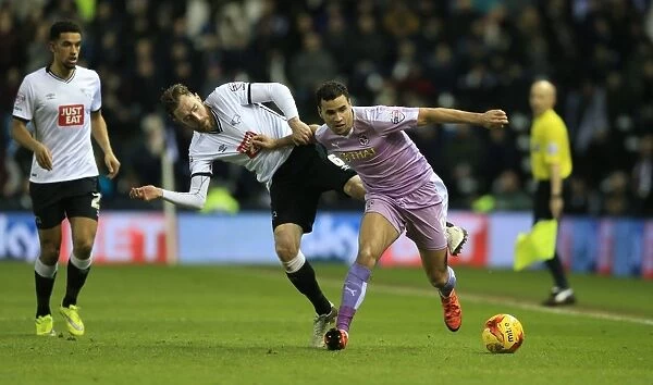 Intense Battle for Supremacy: Keogh vs. Robson-Kanu at iPro Stadium - Derby County vs. Reading