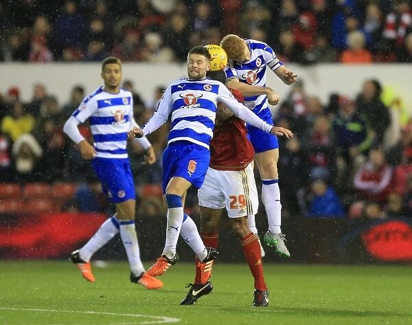 Intense Triangle Tussle: O'Grady vs. Norwood & McShane - Battle for Possession in Nottingham Forest vs. Reading (Sky Bet Championship)