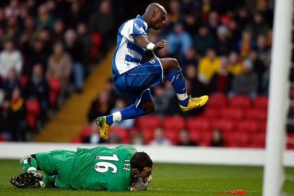 Leroy Lita jumps over the Watford goalkeeper