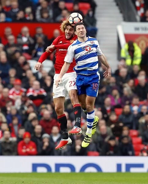 Manchester United vs. Reading: Fellaini vs. Kermorgant - Aerial Battle in the Emirates FA Cup Third Round at Old Trafford
