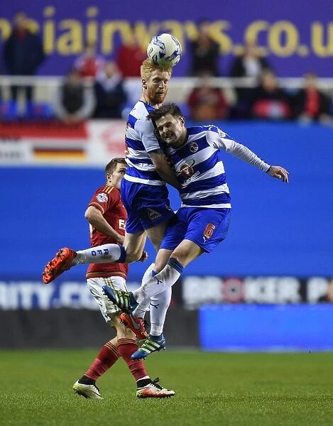 Norwood and McShane in Action: A Tight Battle for the Ball - Reading FC vs. Nottingham Forest (Sky Bet Championship, Madejski Stadium)