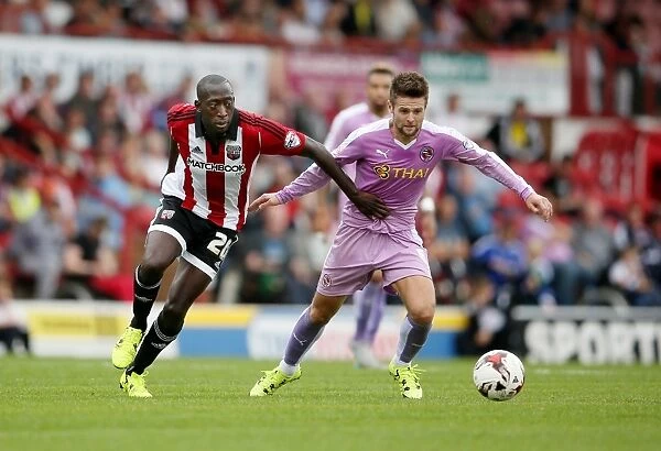 Norwood vs. Diagouraga: A Championship Showdown at Griffin Park - Brentford's Clash with Reading