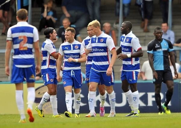 Pavel Pogrebnyak's First Goal for Reading FC: A Joyous Moment with Team Mates Against Wycombe Wanderers