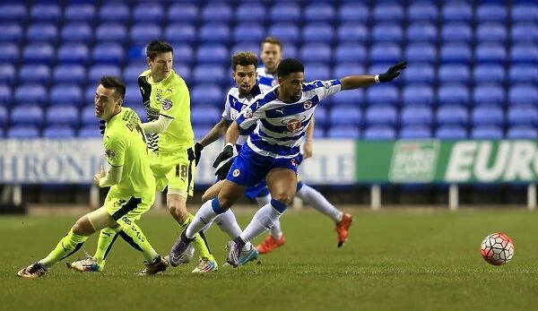 Reading's McCleary Outmaneuvers Huddersfield's Davidson and Lolley: FA Cup Third Round Replay Thriller at Madejski Stadium