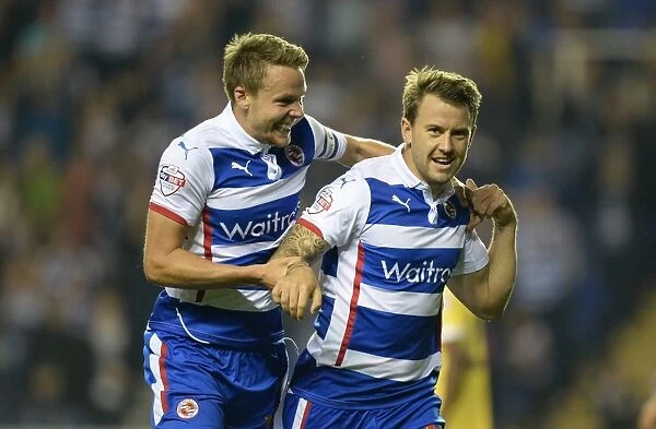 Reading's Simon Cox and Chris Gunter: A Jubilant Moment as They Celebrate First Goal Against Millwall in Sky Bet Championship