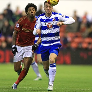 Battle for the Ball: Mendes De Graca vs. Taylor in Nottingham Forest vs. Reading Championship Clash at City Ground