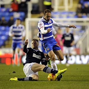 Battle for the Ball: Murray vs. Mills in Reading's Championship Showdown against Bolton Wanderers