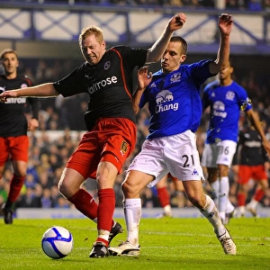 Battling for the FA Cup: Gunnarsson vs Osman - Reading vs Everton, Fifth Round: A Clash of Midfield Titans