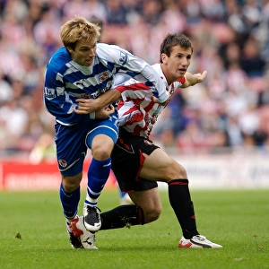 Bobby Convey takes on the Sunderland defence