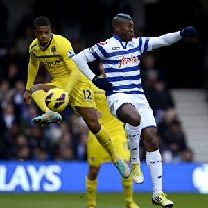Intense Rivalry: McCleary vs. Cisse in the Barclays Premier League Clash between QPR and Reading