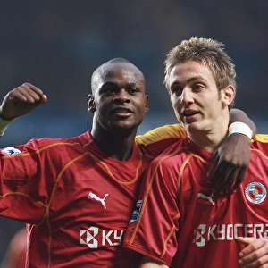 Leroy Lita and Kevin Doyle celebrate Michael Essiens own goal