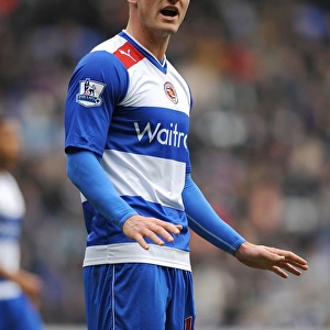 Sean Morrison Faces Off Against Wigan Athletic in Reading's Barclays Premier League Match at Madjeski Stadium (23-02-2013)