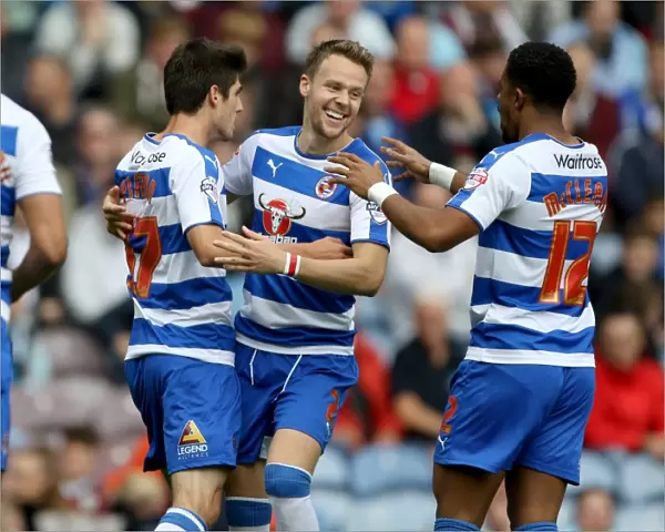 Reading's Lucas Piazon Scores Second Goal Against Burnley: Celebrating with Gunter and McCleary