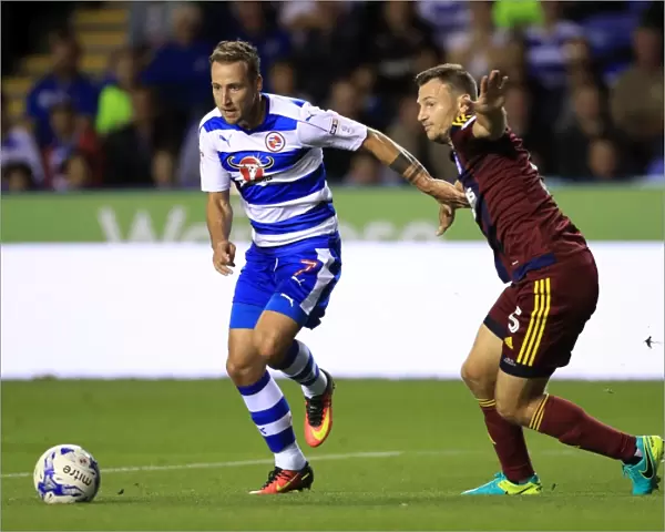 Battle for Supremacy: Roy Beerens vs. Tommy Smith in the Sky Bet Championship Clash at Reading's Madejski Stadium
