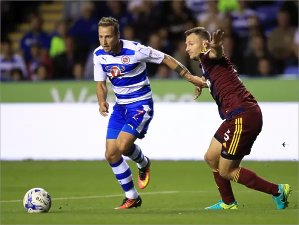 Battle for Supremacy: Roy Beerens vs. Tommy Smith in the Sky Bet Championship Clash at Reading's Madejski Stadium