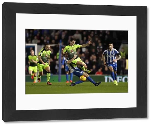 Brighton and Hove Albion vs. Reading: Yann Kermorgant Tackled by Dale Stephens in Sky Bet Championship Match