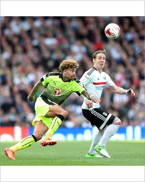 Fulham vs. Reading: Intense Clash between Danny Williams and Stefan Johansen in Sky Bet Championship Play-off First Leg at Craven Cottage