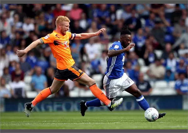 Birmingham City vs. Reading: Intense Battle for the Ball between Jacques Maghoma and Paul McShane