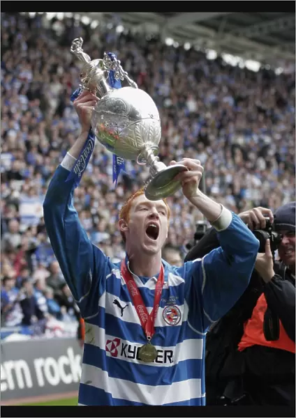 Dave Kitson raises the trophy to the fans