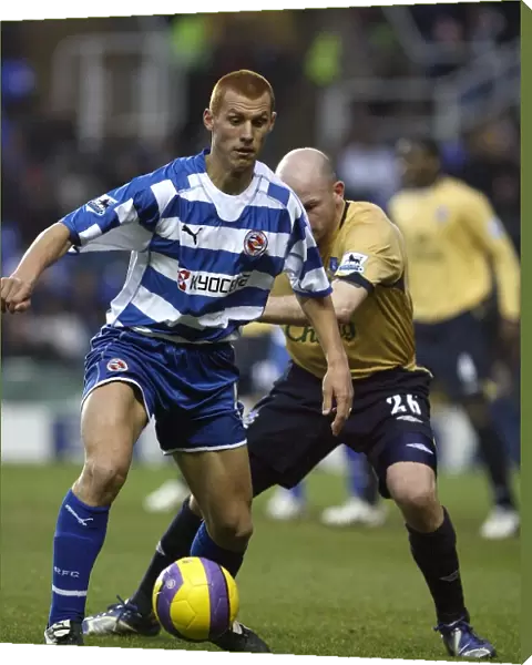 Steve Sidwell receives a shove from Evertons Lee Carsley