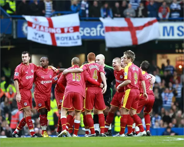 Reading players break from the huddle before the 2-2 draw against Chelsea at Stamford Bridge