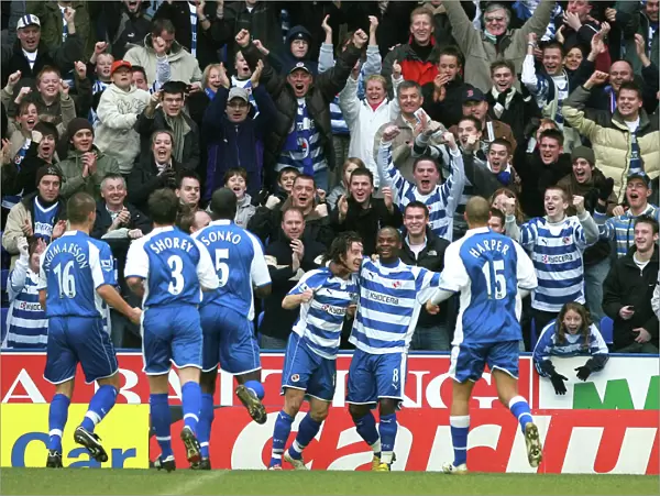 Reading players run to celebrate with Stephen Hunt after he scored in the 15th minute against West H