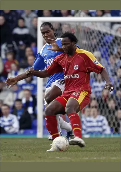 Andre Bikey clears the ball chased by Cameron Jerome