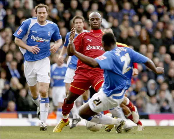Leroy Lita takes on Bruno N Gotty in the 3-2 defeat of Birmingham City