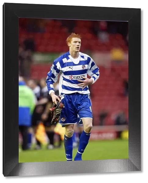 Dave Kitson walks to the away fans to give his boots away