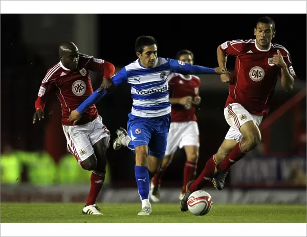 Intense Rivalry: Jem Karacan vs. Jamal Campbell-Ryce - A Battle in the Npower Championship between Reading and Bristol City at Ashton Gate
