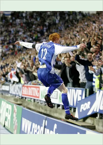 Dave Kitson leaps the advertising boards to celebrate with the fans