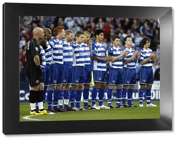 Reading players show their respect for Alan Ball before the Newcastle game