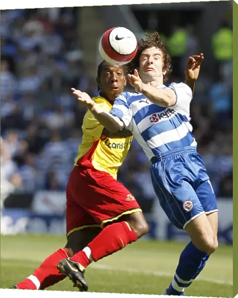 Stephen Hunt fights to control the ball against Watford