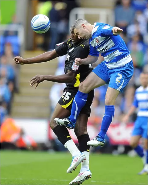 Intense Clash: Griffin vs Emmanuel-Thomas in Reading's Championship Play-Off Semi-Final Against Cardiff City (First Leg) at Madejski Stadium