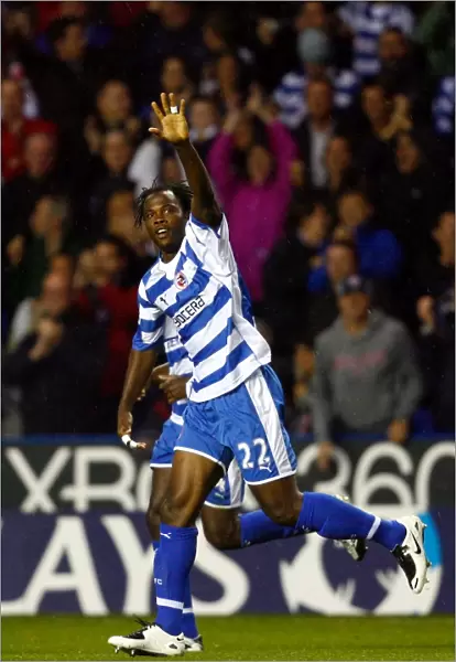 Andre Bikey salutes the crowd after scoring