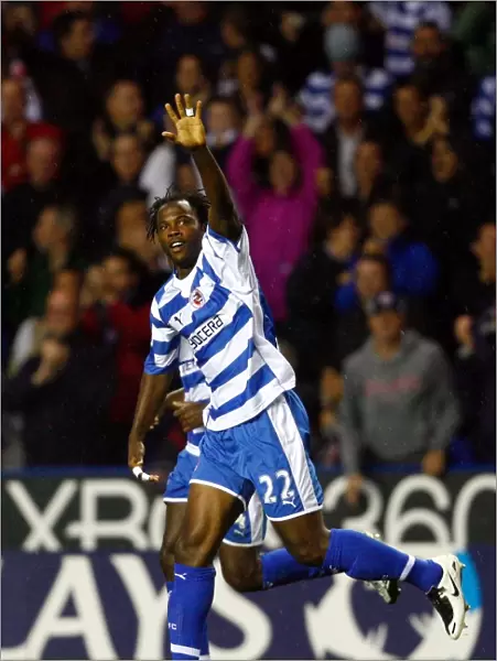 Andre Bikey salutes the crowd after scoring