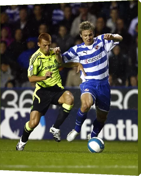 Kevin Doyle holds of former Reading player Steve Sidwell