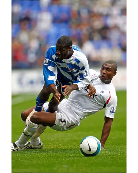 Emerse Fae is brought down by Jlloyd Samuel