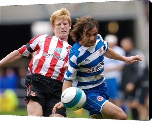 Stephen Hunt challenges for the ball