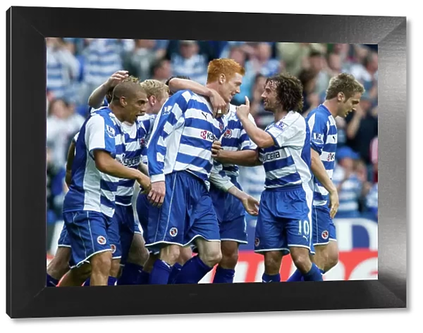Dave Kitson is congratulated after setting up James Harpers winning goal