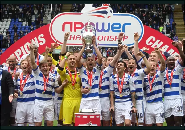 Reading FC: Celebrating Promotion to Championship with Trophy Lift at Madejski Stadium