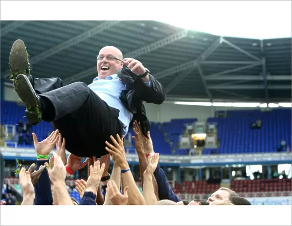 Reading FC: Celebrating Promotion - Emotional Lift: Brian McDermott Surrounded by Jubilant Players