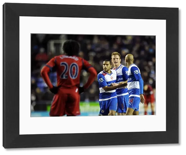 Reading FC's Triumph: Mariappa, Pearce, and Kebe's Celebration as Lukaku Disappointedly Looks On (January 12, 2013)