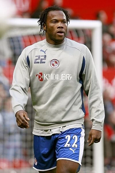 Andre Bikey warms up at Old Trafford