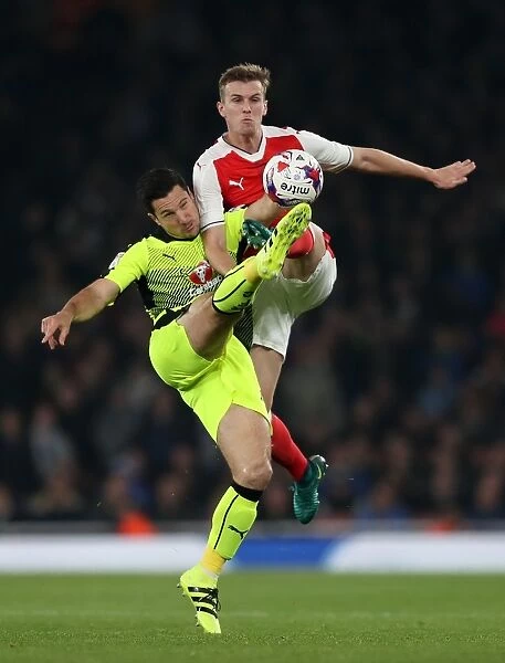 Arsenal vs. Reading: Intense Battle for the Ball - Yann Kermorgant vs. Rob Holding, EFL Cup Round of 16, Emirates Stadium