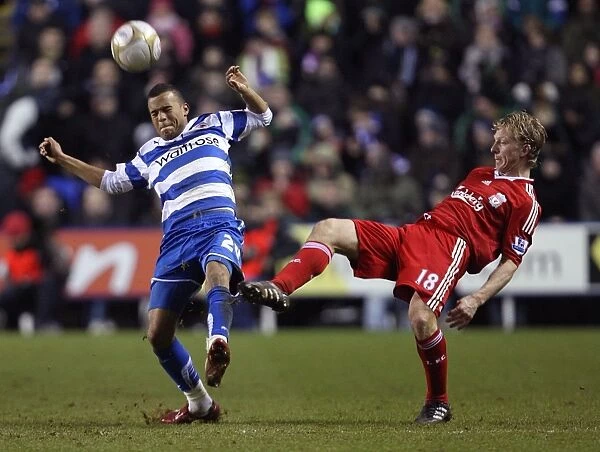 Battle for the Ball: Bertrand vs. Kuyt in the FA Cup Third Round at Madejski Stadium